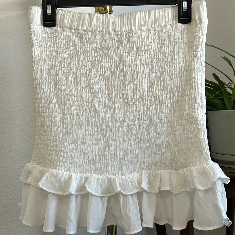 White ruffle tub top. Never worn!